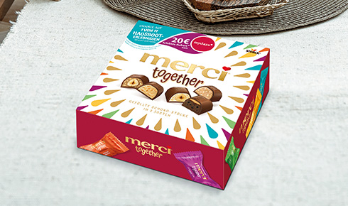 merci together Verpackung mti mydays Kooperation auf einem Tisch